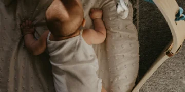 The Science of Sweet Dreams: Understanding Infant Sleep Patterns 10 A toddler sleeping in a cozy bed