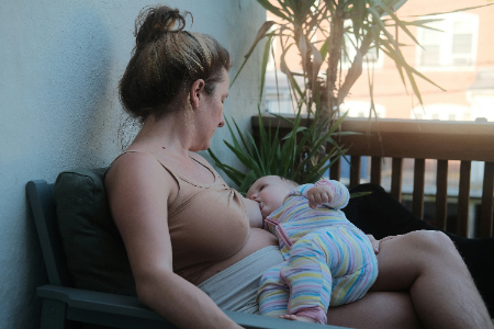 The Ultimate Guide to Establishing a Healthy Newborn Feeding Routine 35 A mother breast feeding her child